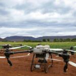 Aerial drones in a field, showcasing modern agricultural technology and landscape., tags: deutscher agrar-iot-markt steht - pexel